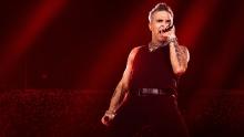 an image of Robbie Williams on stage 
