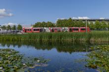 a tram passes through Edinburgh Park