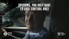 A male driver looking into the camera as shards of glass suggest a broken windscreen. Caption reads: 'Speeding, you only have to lose control one'.