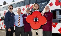 Edinburgh Trams and Lothian Buses colleagues with JJ Chalmers