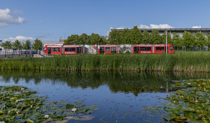 a tram passes through Edinburgh Park