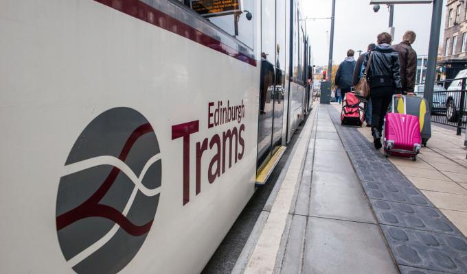 an image of a tram at a tram stop