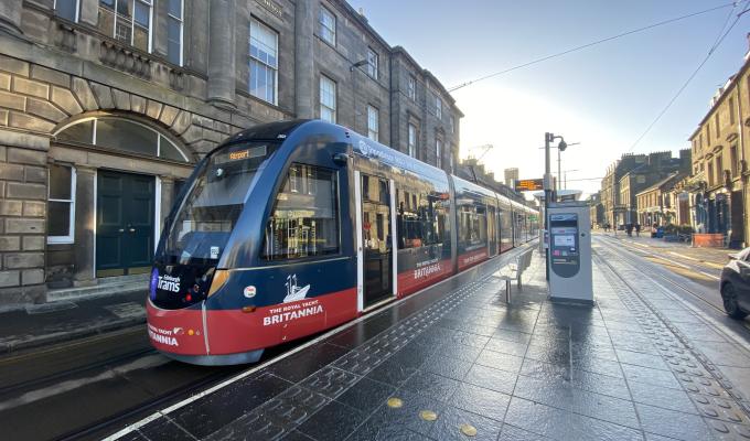 an image of a tram at a tram stop