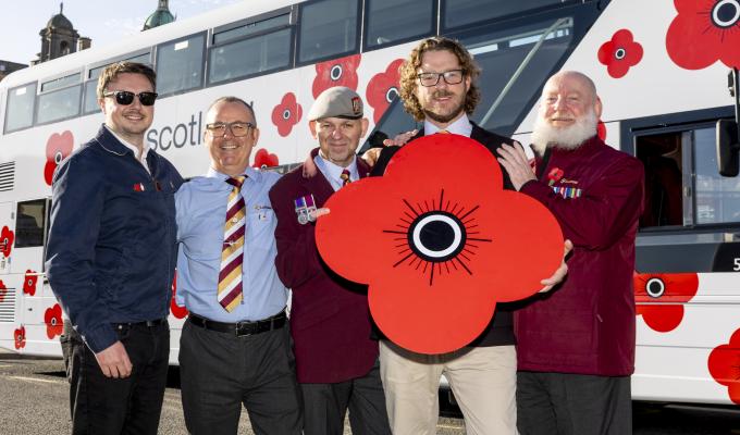 Edinburgh Trams and Lothian Buses colleagues with JJ Chalmers